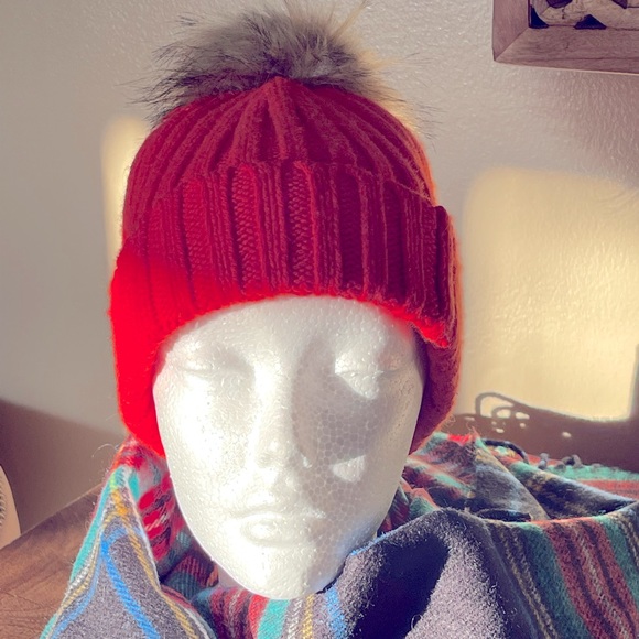 J. Crew Red beanie with faux fur Pom Pom.